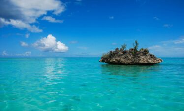 scenic view of rock formation on a calm sea