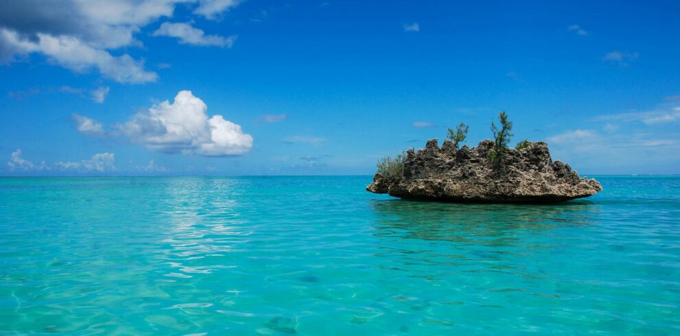 scenic view of rock formation on a calm sea